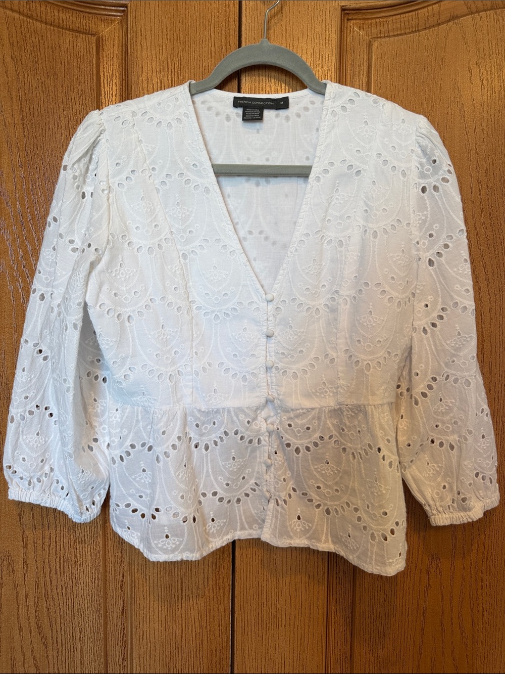 White Eyelet V-Neck Peplum Blouse